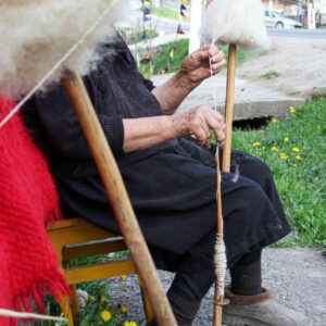The process of spinning wool into hand-woven blankets