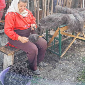 The process of spinning wool into hand-woven blankets